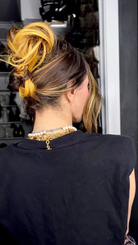 Instagram post by @larisadoll for Joico. Caption reads: [...] bun. You’re welcome. 🖤 Using all....