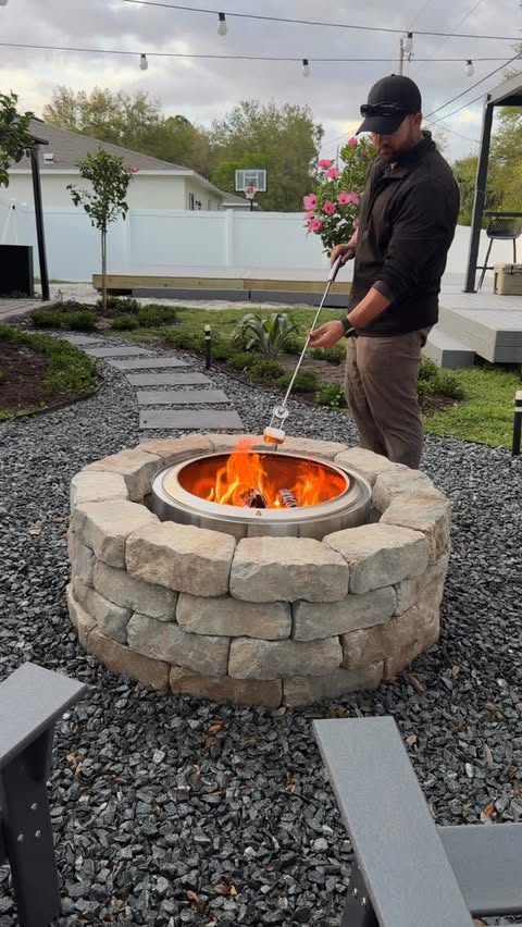 Instagram post by @homewithmike_ for Solo Stove. Caption reads: [...] new Summit 27 smokeless fire pit from....