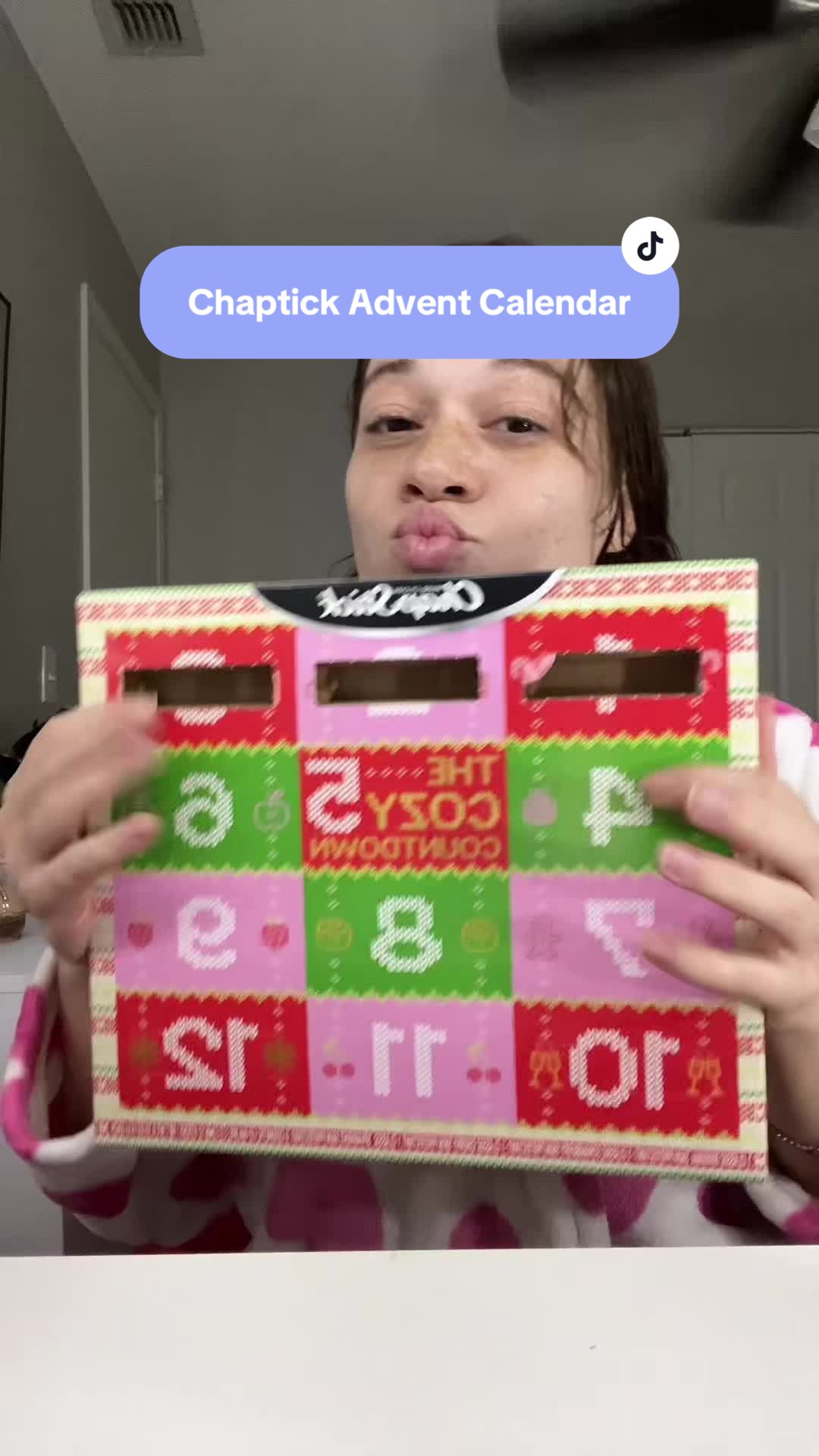 TikTok post by @cheymd25 for ChapStick. Caption reads: @ChapStick.US I love this advent calendar! [...].