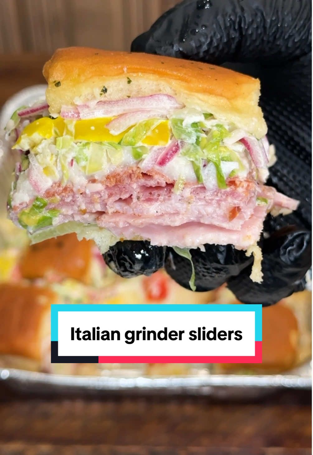 TikTok post by @ninjacue for Bear Mountain BBQ. Caption reads: Italian Grinder Sliders Don’t sleep on these....