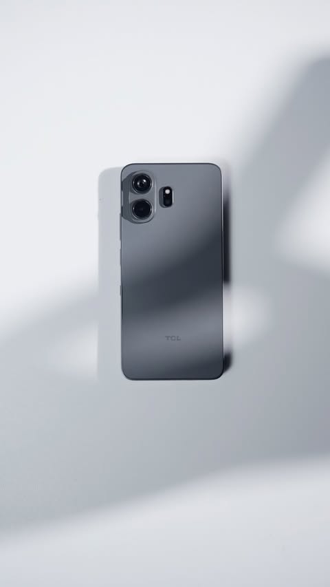 Instagram post by @ogrobbytv for TCL USA. Caption reads: This phone surprised me. @tcl_usa #TCL....