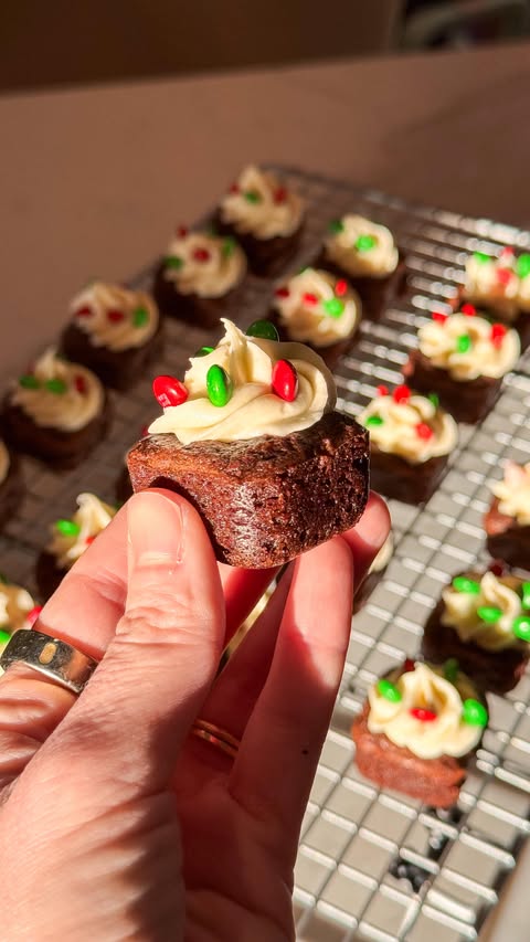 Instagram post by @nicole_thenomad for Ghirardelli. Caption reads: everything good in one, tiny, festive bite 😍🎄✨....