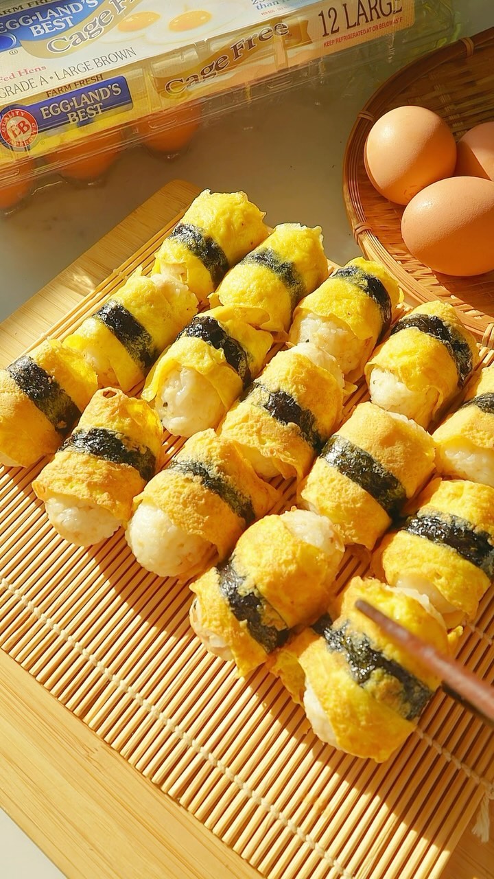 Instagram post by @fationatefoodbelly for Eggland's Best. Caption reads: egg roll sushi 🍳🍣☀️

Comment “gimme recipe” and....