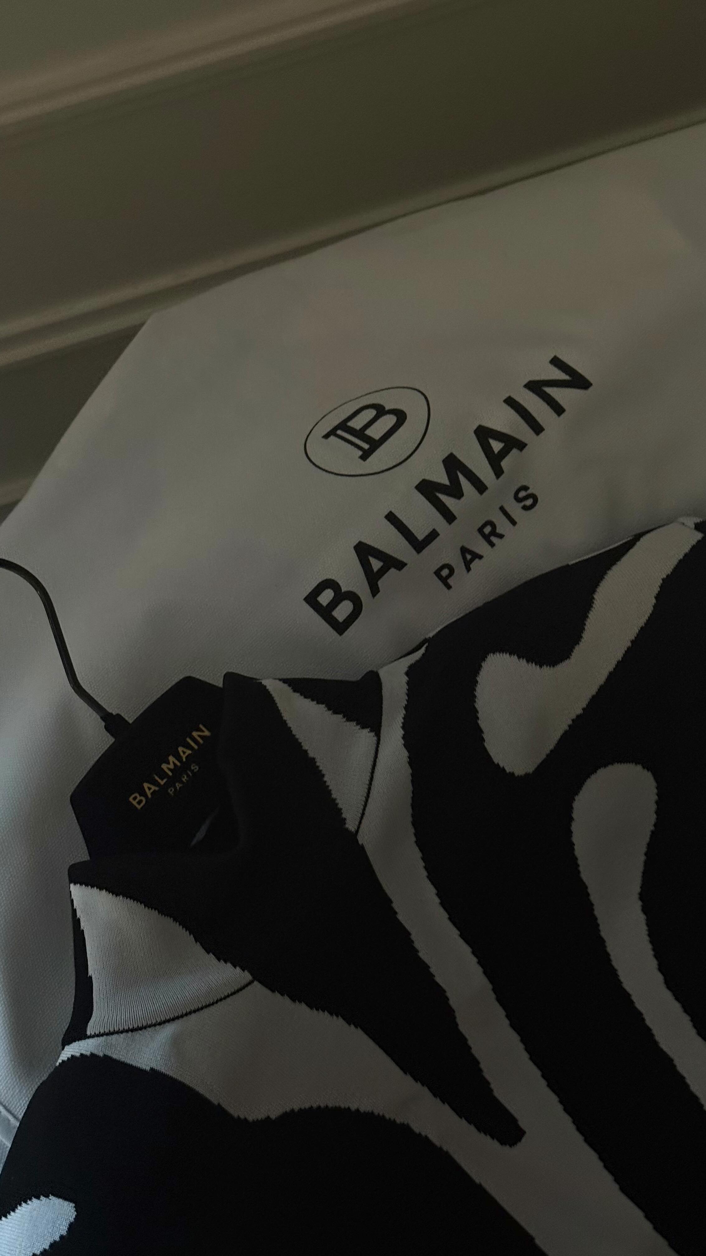 Instagram post by @sharfonseca for Balmain. Caption reads: Fitting for @balmain 🤍🥰
Invitedby.