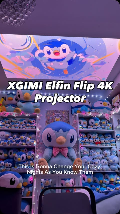 Instagram post by @piplup.gamer for XGIMI. Caption reads: XGIMI Elfin Flip 4k Projector 📽️ This [...].