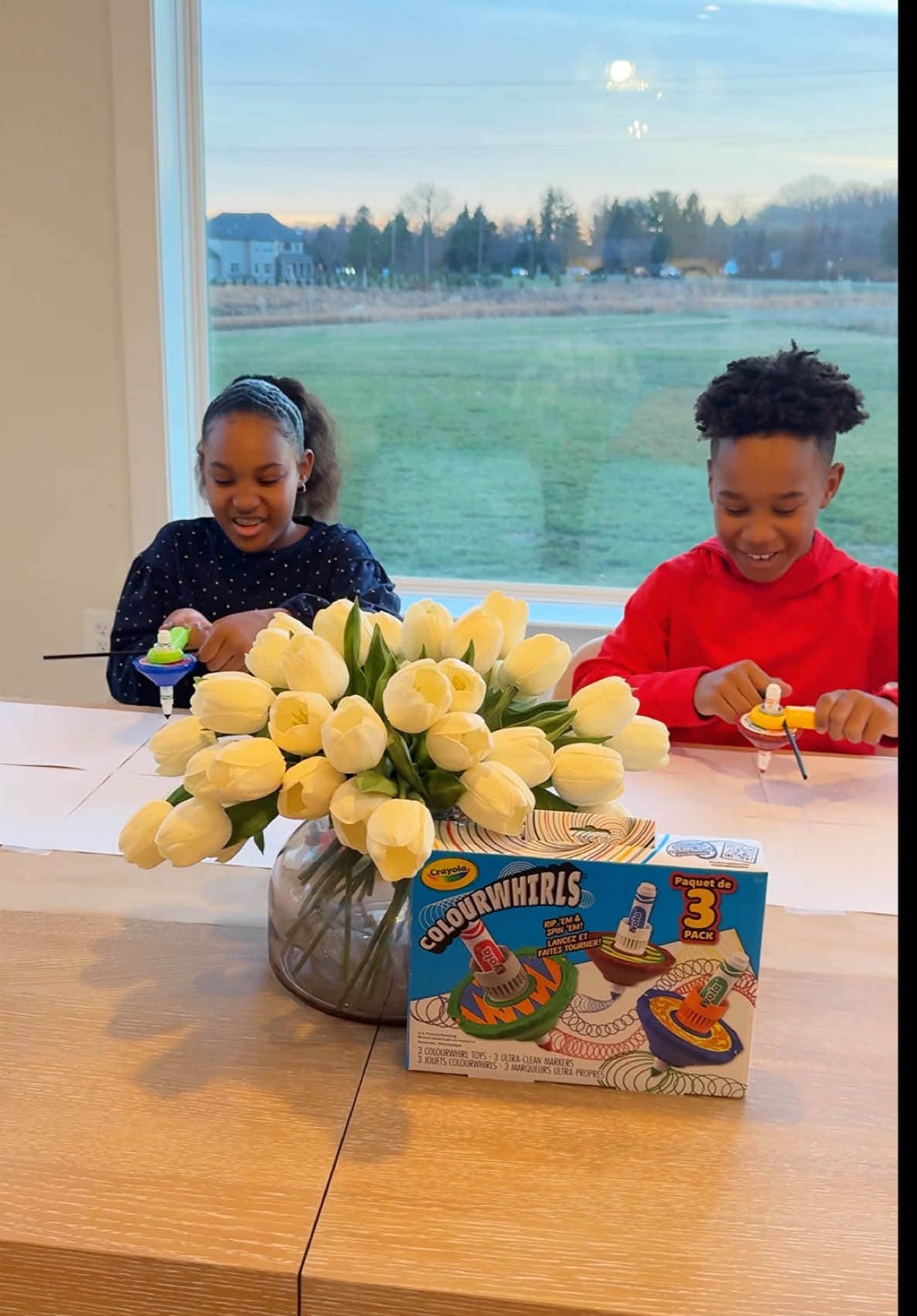 TikTok post by @yolandekelly for Crayola. Caption reads: #ad These @Crayola Colourwhirls kept my kids....