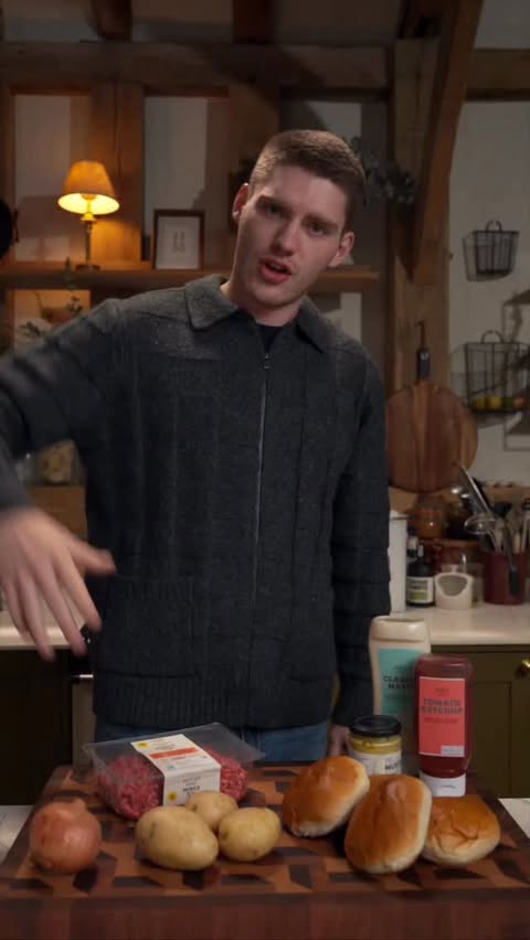 Instagram post by @tylerbutt_eats for Marks and Spencer. Caption reads: Cheeseburger Slider Traybake with Crispy Fries &....