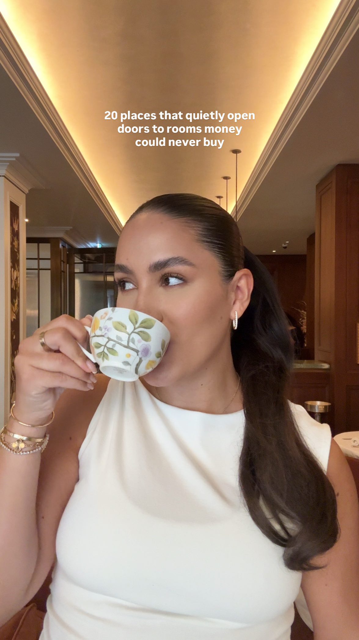 Instagram post by @taislany for SIF JAKOBS JEWELLERY. Caption reads: 🍵 hotel lobbies at 5pm
a herbal tea in hand, calm....