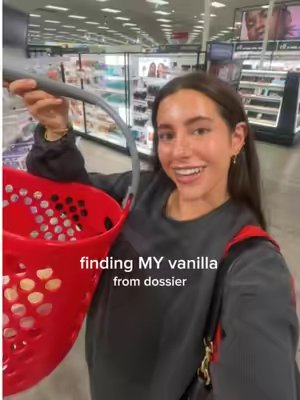 TikTok post by @madelineboyerr for Dossier Perfume. Caption reads: [...] picks on their next Target run!! 🍨 @Dossier....