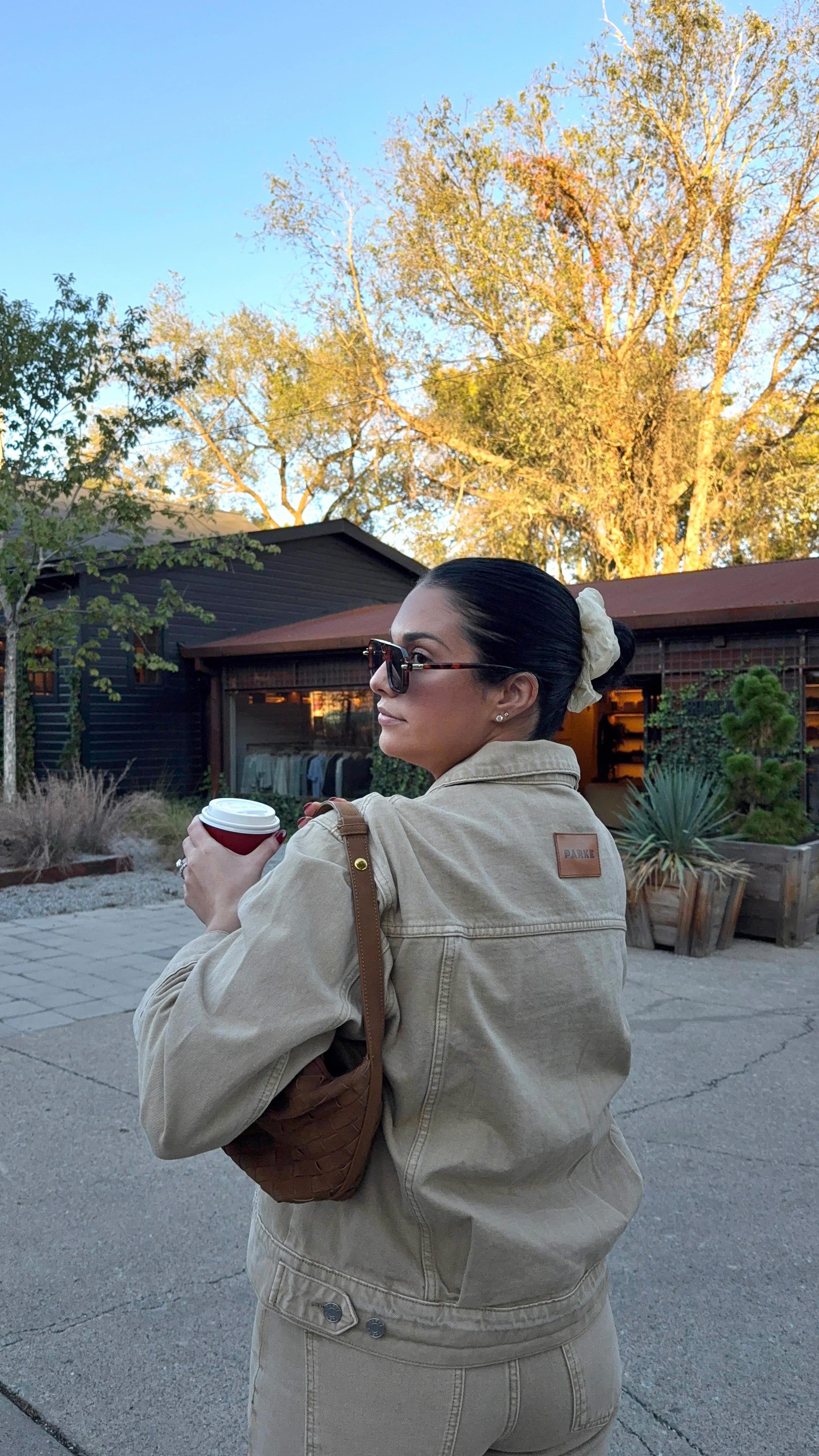 Instagram post by @carlylethornton for Parke. Caption reads: Cozy autumn days in new @parke denim🐻☕️ linked on....