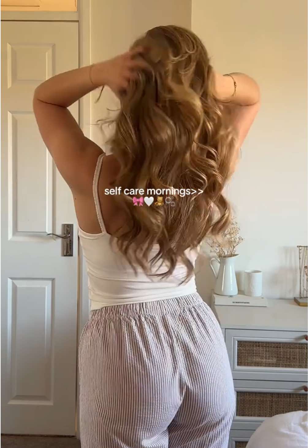 TikTok post by @chloemdarling for Hairburst. Caption reads: The best kind of morning🧖🏼‍♀️🎀🫧 @hairburst ad....