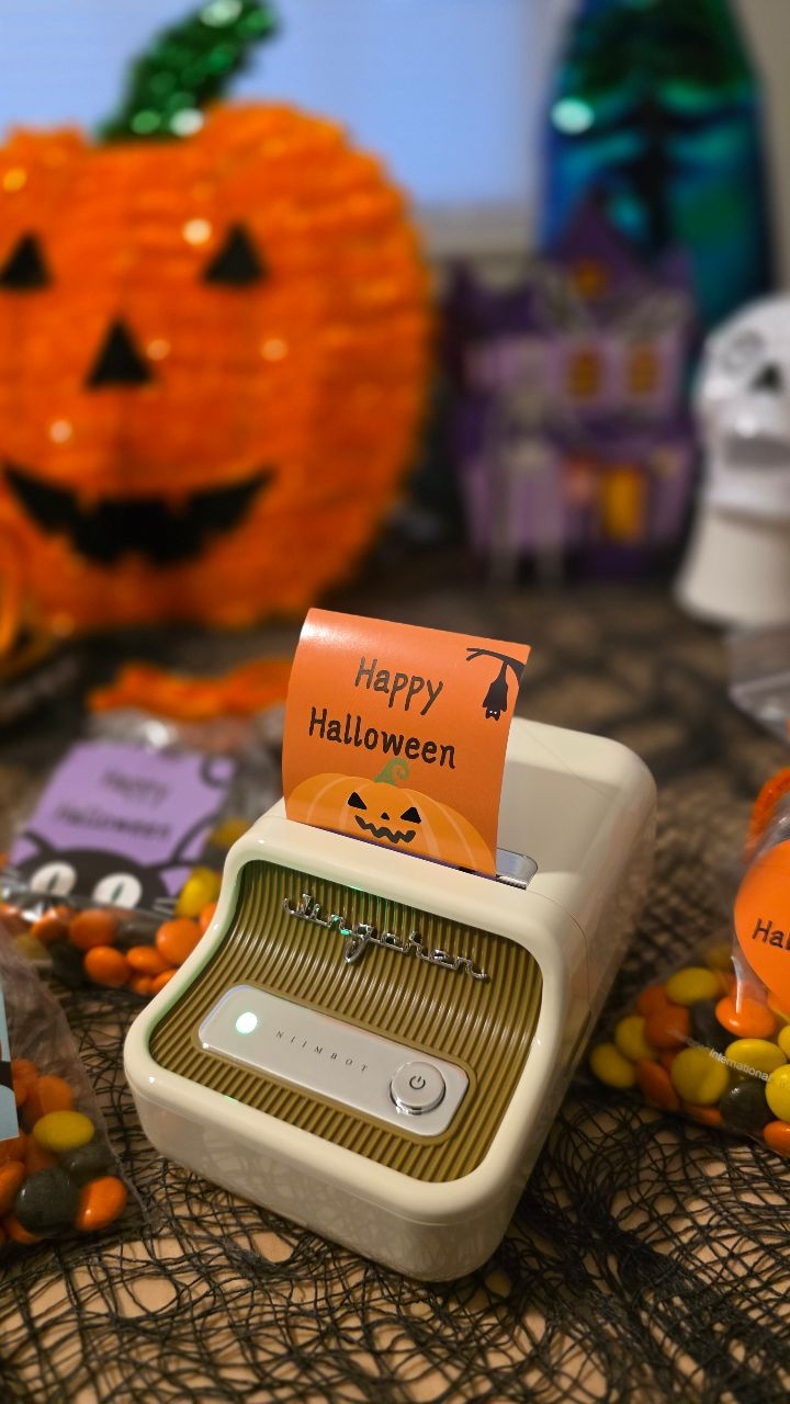 Instagram post by @bklynzim for NIIMBOT. Caption reads: [...] super easy. It's totally obsessed! 🎃....