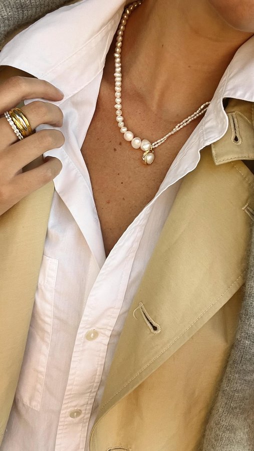 Instagram post by @annieculbertson for At Present. Caption reads: pearls are always in! #stylingvideo #fallstyling....