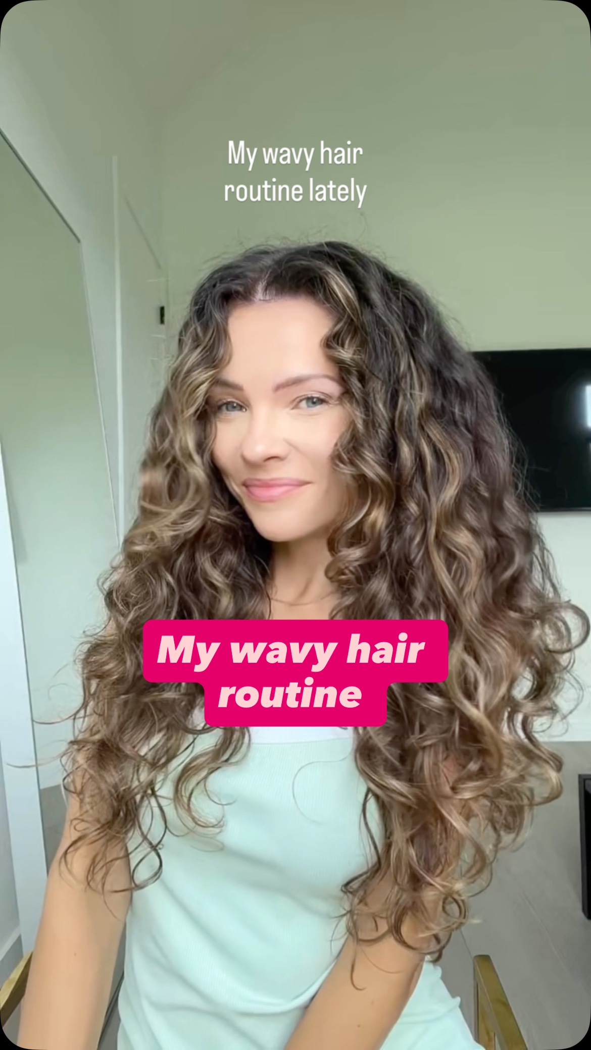 Instagram post by @wavycurly for Ouidad. Caption reads: My wavy hair routine lately✨

The combo of mousse....