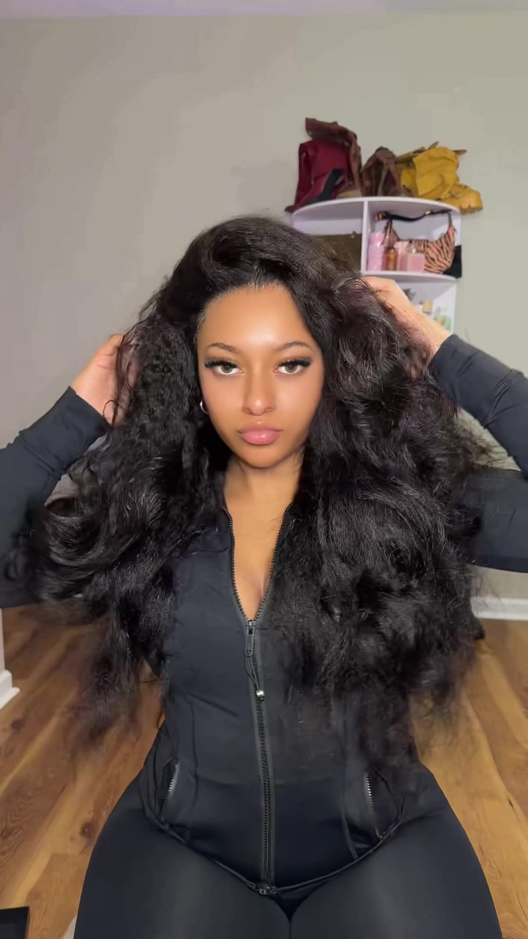 TikTok post by @symphonymariah for Curlyme. Caption reads: I’m wearing the 24 inch from @CurlyMe Hair....