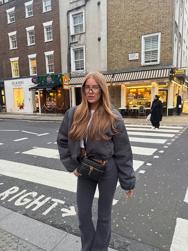 Instagram post by @avaadaniels for White Fox Boutique. Caption reads: all bundled up🐨🖤
ad use my code AVADANIELS for....