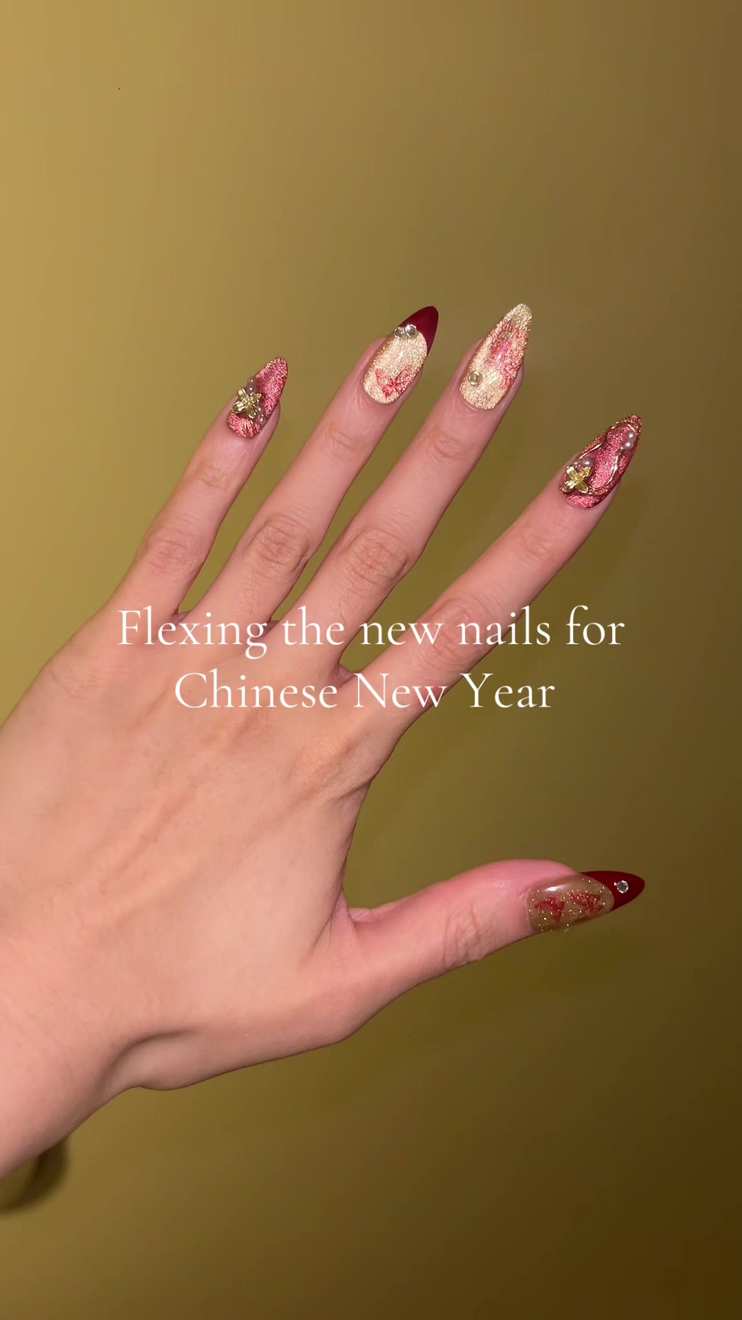 TikTok post by @meibaemei for Ersa Nails. Caption reads: [...] #cny #asiannailart #nailinspo @Ersa Nails.