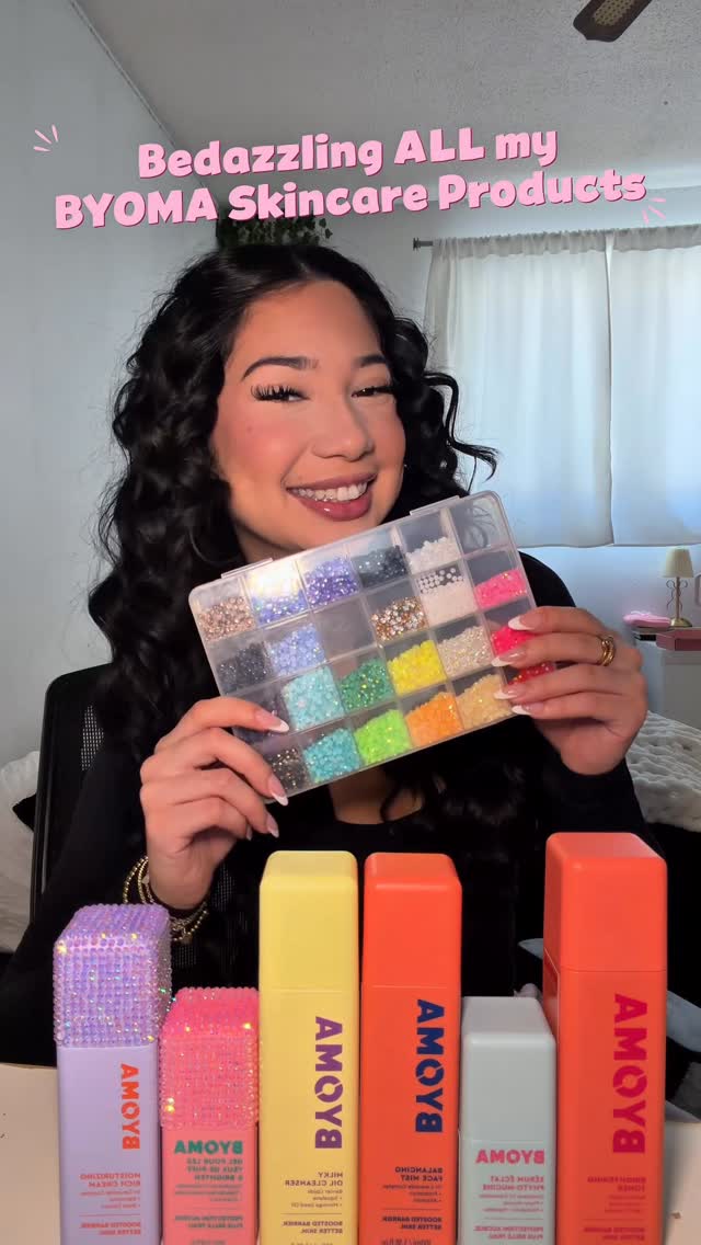 Instagram post by @rhiannareyess for BYOMA. Caption reads: Bedazzling all of my @byoma skincare products pt.3....