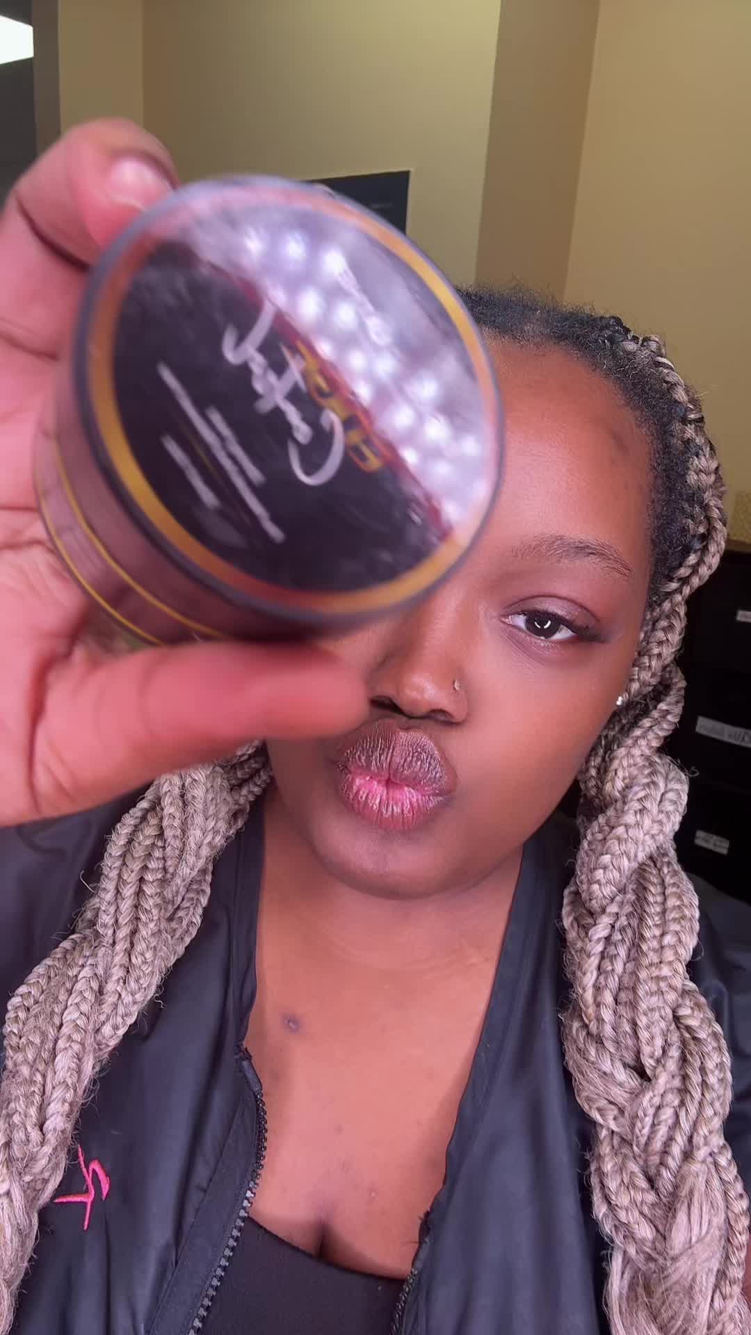 TikTok post by @thebraidingbrat for Bask & Lather Co. Caption reads: @Bask and Lather Co edge control will hold my....