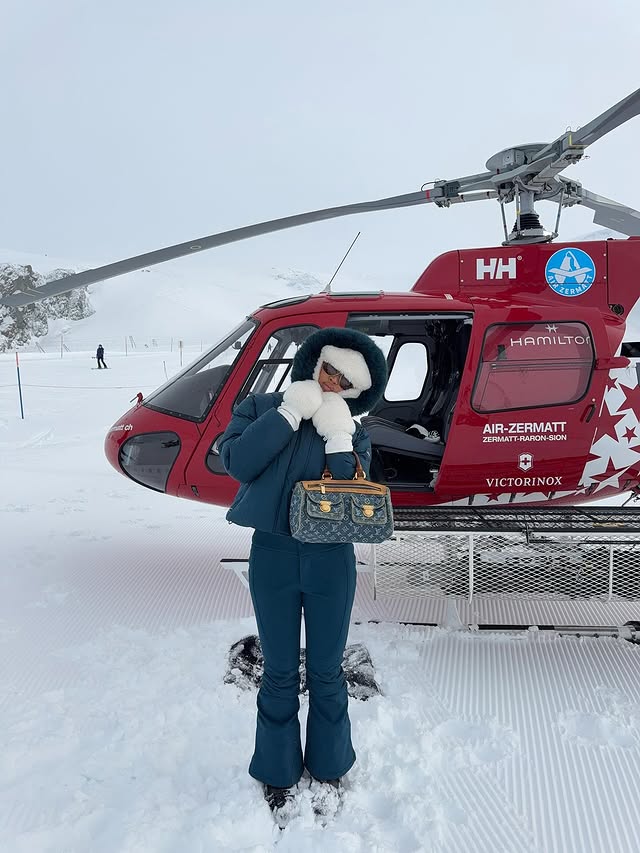 Instagram post by @michelledomingos for boandtee. Caption reads: [...] time in a helicopter OMGGGGGGG😱😨😰....