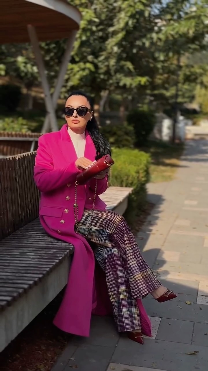 Instagram post by @_doctorr for StyleWe. Caption reads: An urban classic long coat and multi-layered,....