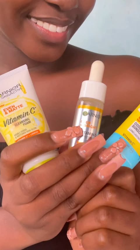 Instagram post by @_trin.ahh for Garnier East Africa. Caption reads: Think of your skin as your ultimate shield. 🛡️....