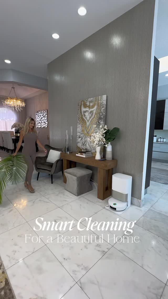 Instagram post by @marina.b.style for Dreame. Caption reads: Love how DREAME X50 Ultra keeps my home clean....