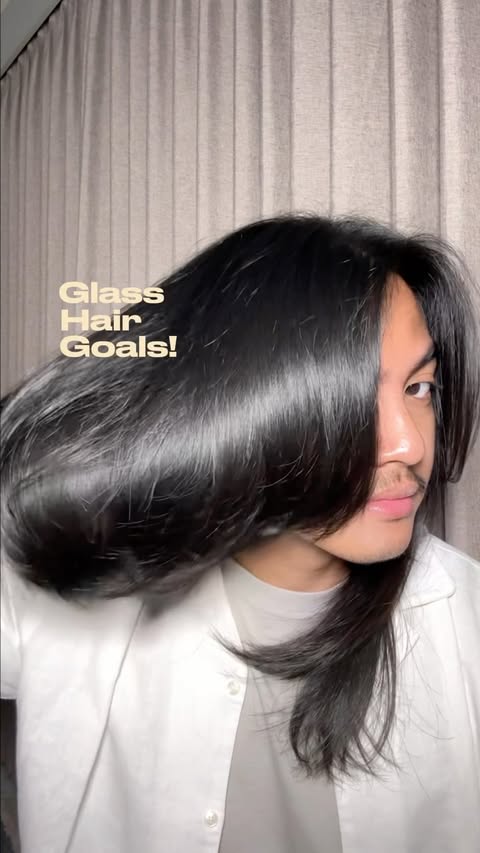 Instagram post by @adenjaxmi for L'Oréal Indonesia. Caption reads: Jar pink satu ini udah jadi go-to hair mask gue....