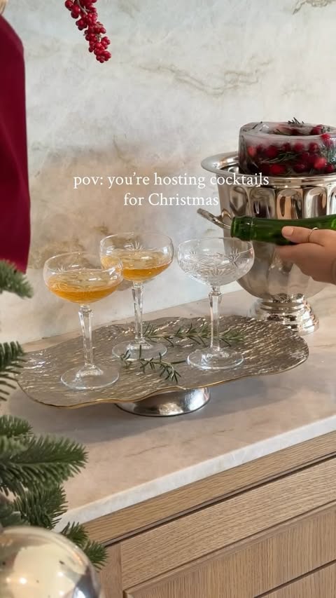 Instagram post by @karlibree for Pottery Barn. Caption reads: Friendsmas, Christmas cocktails, and appetizers at....