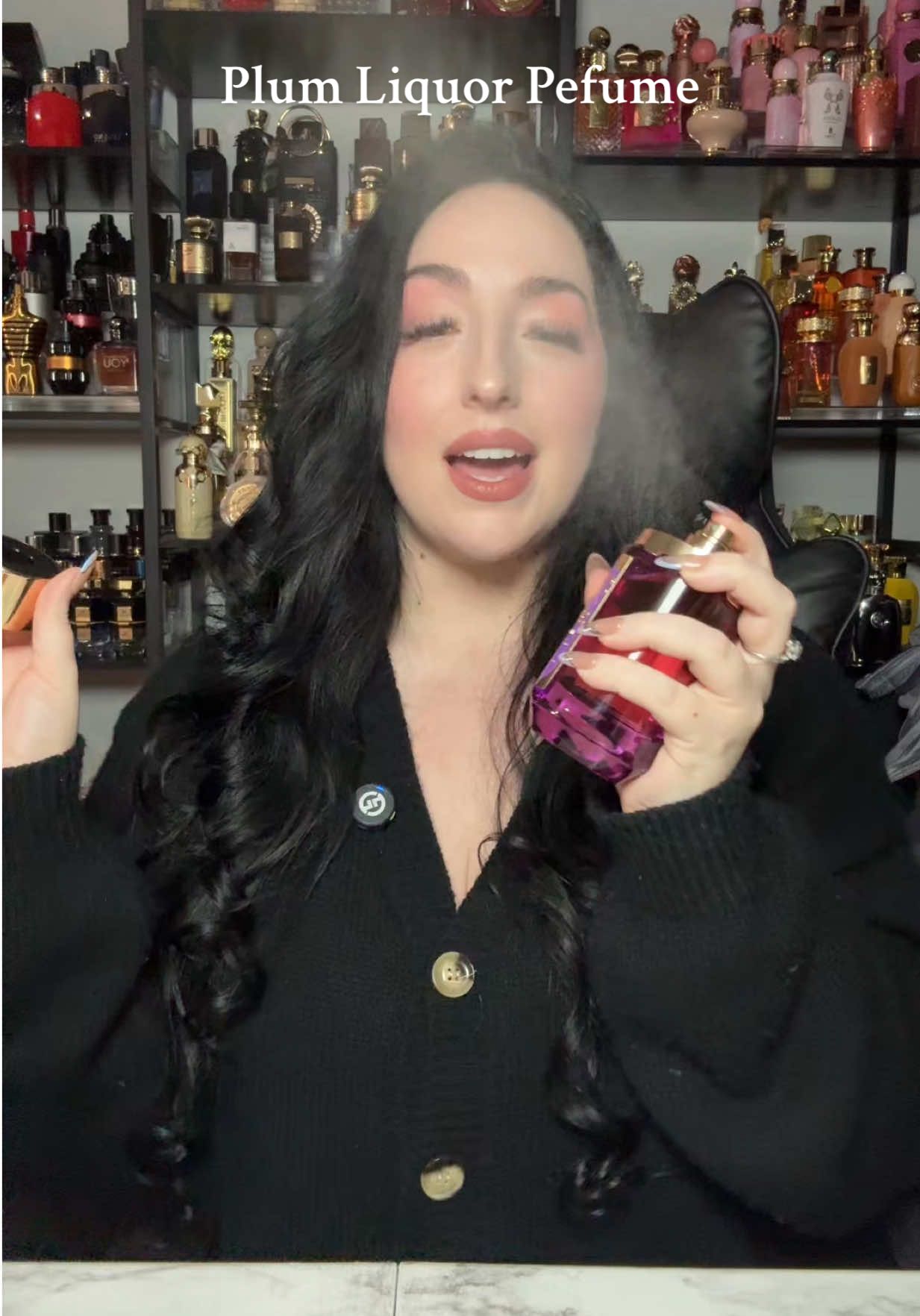 TikTok post by @itsari_b for Aroma Concepts. Caption reads: [...] 🥃💜 #plumliquor #perfume #fragrance....