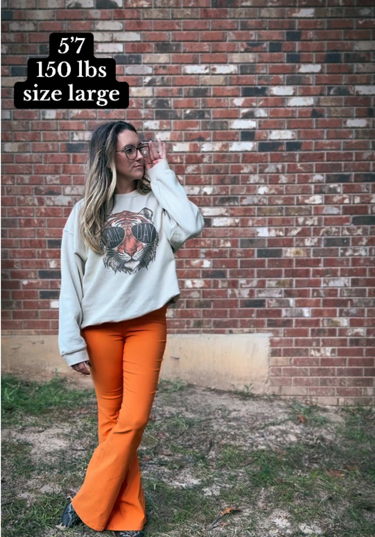 TikTok post by @chey.notshy for Willow Boutique. Caption reads: the perfect flares for spooky szn 🎃....