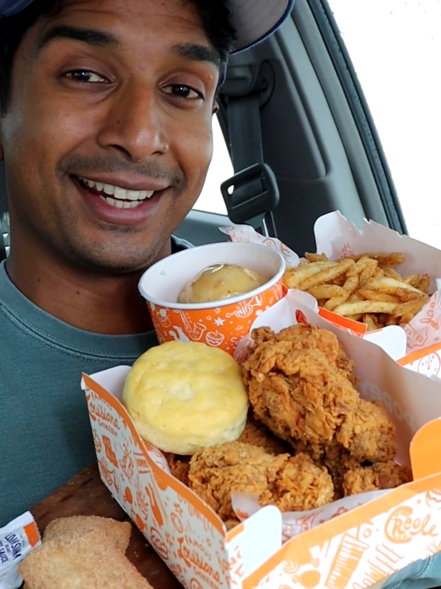 TikTok post by @brandon.r.food.re for Popeyes. Caption reads: More ASMR Popeyes Mukbang on a rainy LA day....