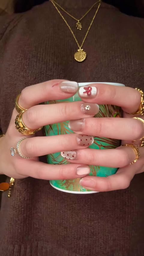 Instagram post by @rubat0sis_official for Nominal. Caption reads: All jewellery from @nominal ✨

#nominal #nailart....