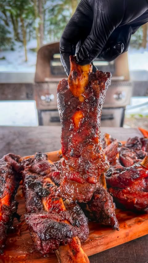 Instagram post by @grillhunters for Cuisinart. Caption reads: Did these 1h whiskey ribs on the grill last night…....