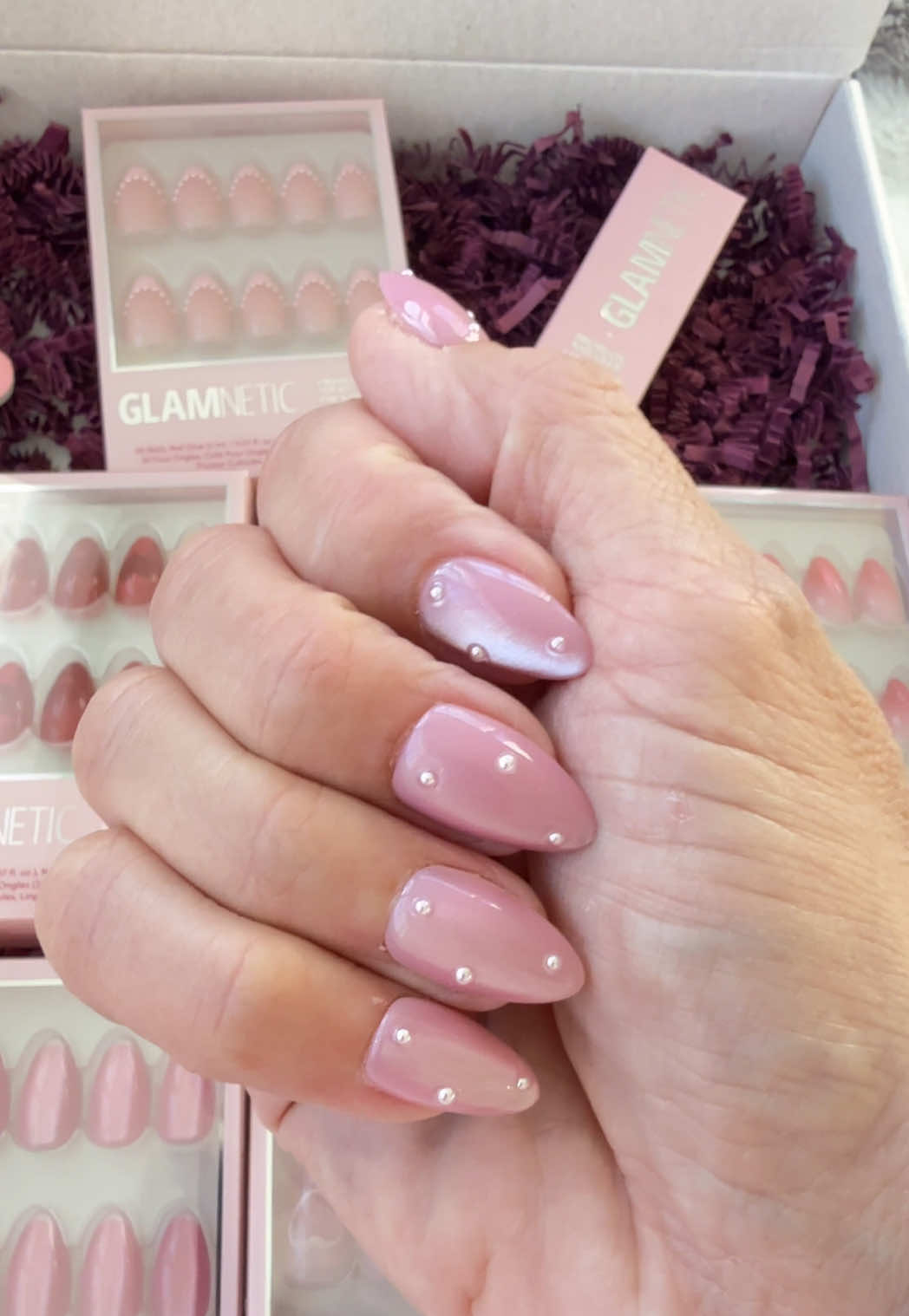 TikTok post by @simplemomhacks for Glamnetic. Caption reads: A new, stunning collection of Glamnetic press on....