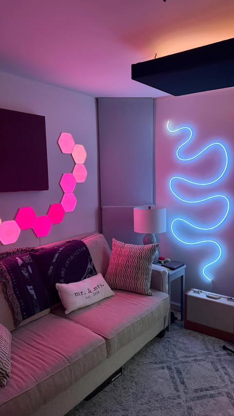 Instagram post by @asherpostman for Nanoleaf. Caption reads: My studio got a MAJOR glow up. Shoutout @nanoleaf....