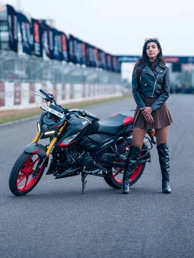 Instagram post by an influencer for TVS Apache Series. Caption reads: [...] motoring show 🇮🇳 with @tvsapacheseries .....