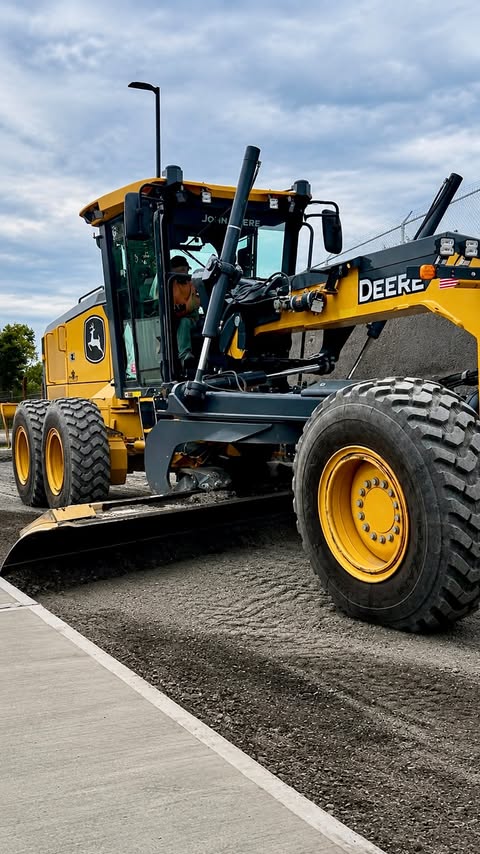 Instagram post by @bob_dietz_and_sons_inc for John Deere. Caption reads: Powered by John Deere. Guided by Topcon. Built by....