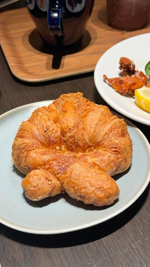 Instagram post by @wantwoeatsg for Singapore Travel Specialist by Dirgantara Fasa. Caption reads: [media invite] The FAMED Bakery from Japan has....