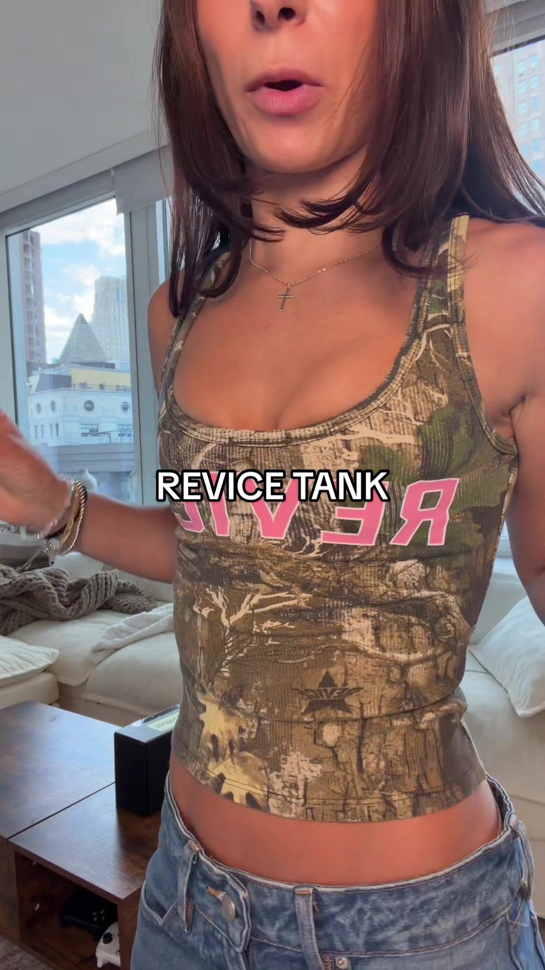 TikTok post by @_alanacalvs for Revice Denim. Caption reads: I will be wearing @Revice tanks only from here on....