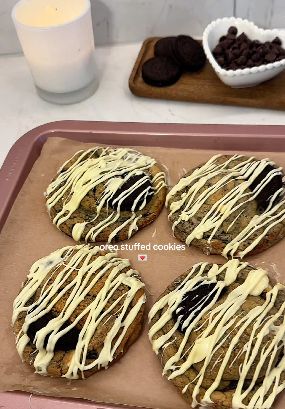 TikTok post by @bakeswithmarlene for MUNBYN. Caption reads: Stuffed Oreo Cookies 🤎🍪🍫 Using the @MUNBYN 941B....