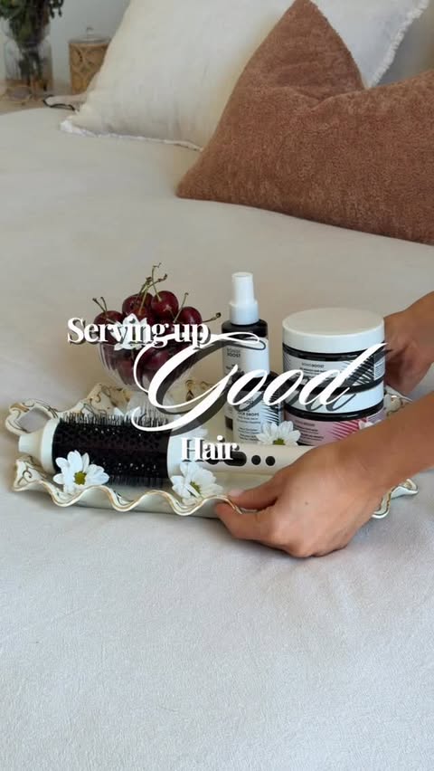 Instagram post by @rhemybea for BondiBoost. Caption reads: [...] of serving good hair with @bondiboost 🤍....