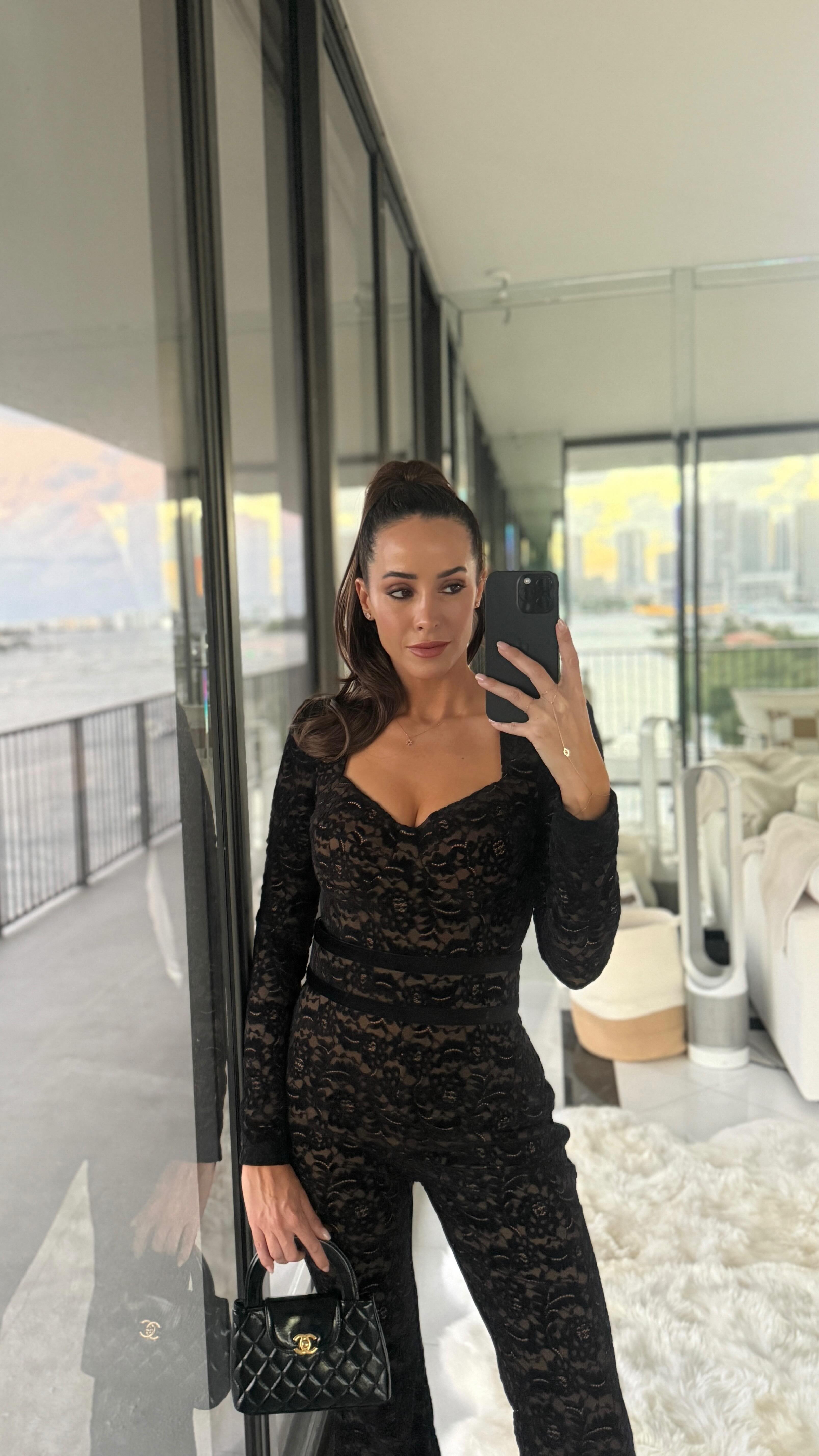 Instagram post by @lizkennedy for Nadine Merabi. Caption reads: Comment OUTFIT for the look sent to your DM, I....