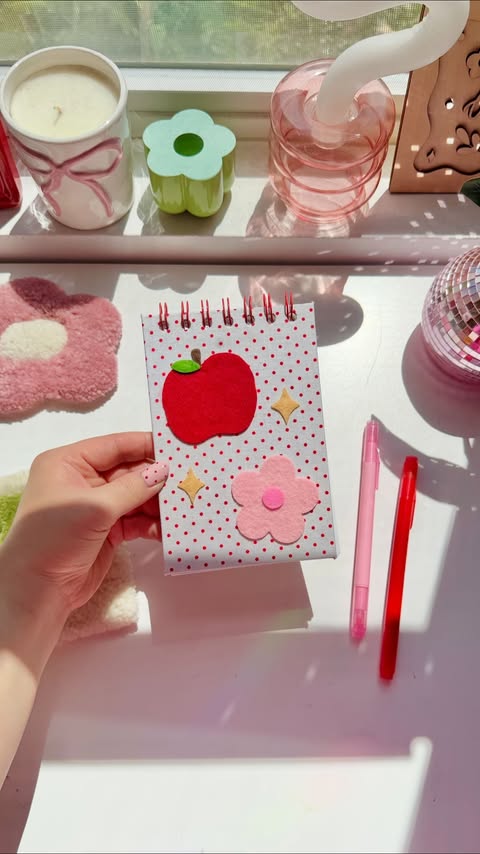 Instagram post by @lettersbyshells for xTool. Caption reads: diy notebook 🍎🌼✨ I used the xTool F2 laser....