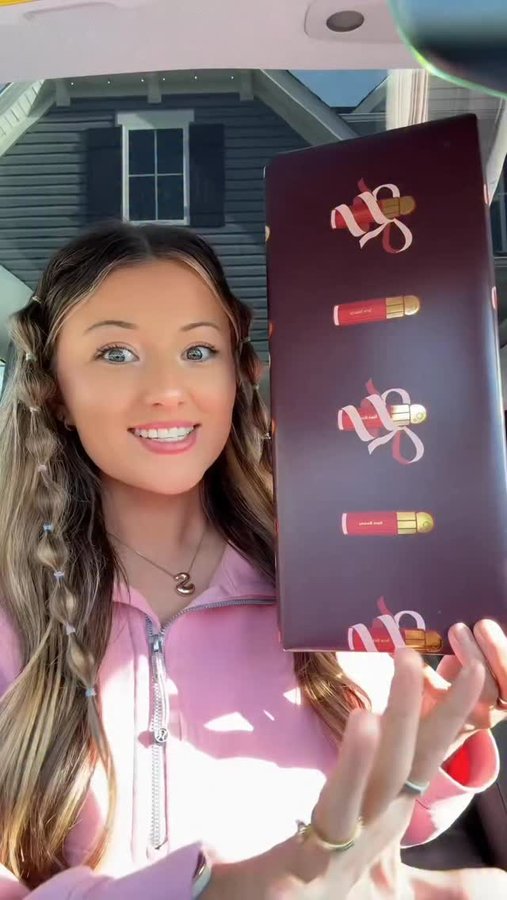 Instagram post by @christi_fritz for Rare Beauty. Caption reads: The wrapping paper!!!😍.