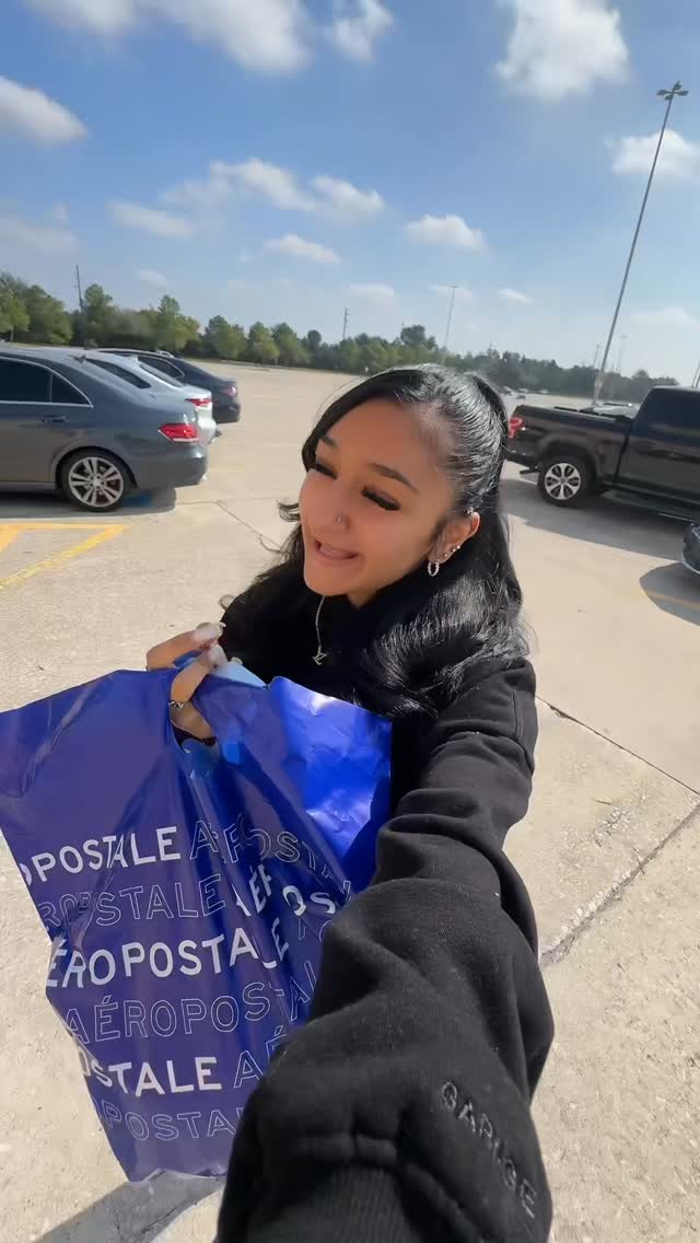 Instagram post by @j.iyaa for Champs Sports. Caption reads: Shoe hunting pt.2 👟🖤 #itscitygirljiya....