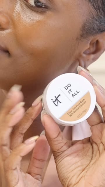 Instagram post by @tenickab for IT Cosmetics. Caption reads: Loving @itcosmetics DO IT ALL sheer tint face balm....