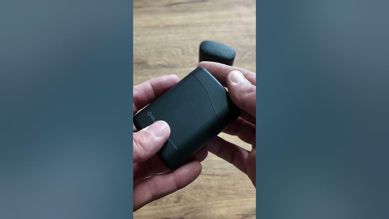 YouTube post by @Code-Reinho-Tactical for OLIGHT. Caption reads: LA MINI PERUN 3.
