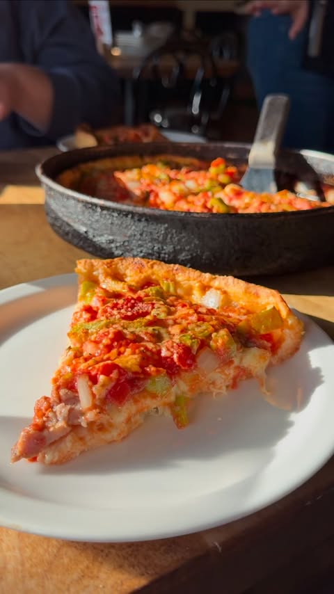 Instagram post by @sassyconfetti for Lou Malnati's. Caption reads: my favorite moments from christmas as a kid was....