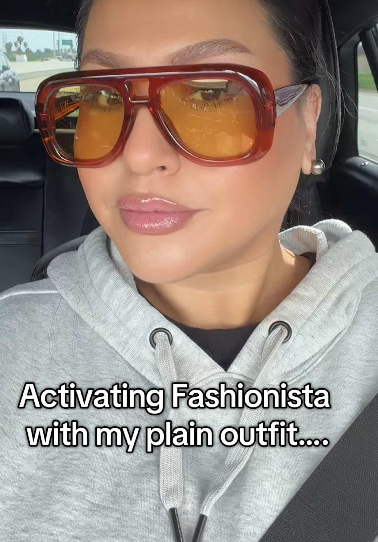 TikTok post by @whatwouldlizzydo for DEZI. Caption reads: [...] This burnt orange is everything 🧡 @DEZI....